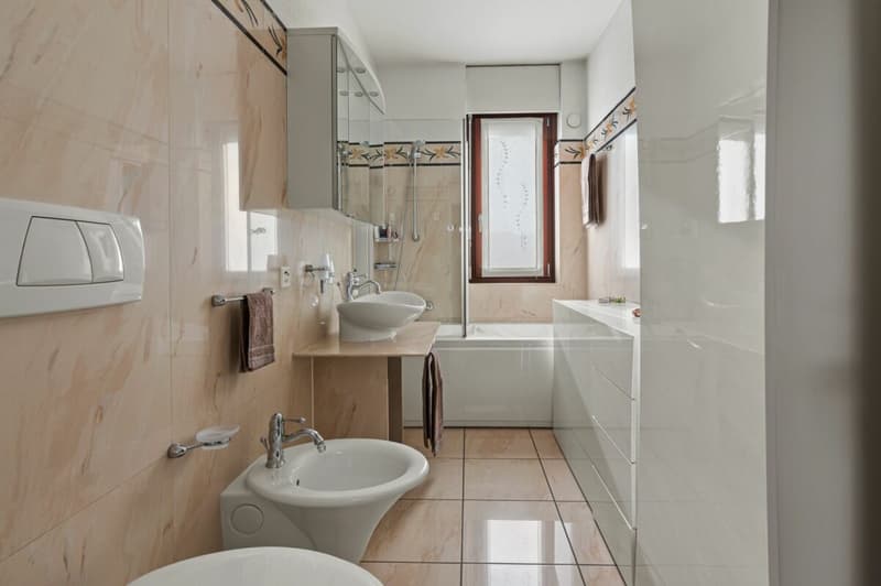 Casa con giardino e piscina condominiale (7)