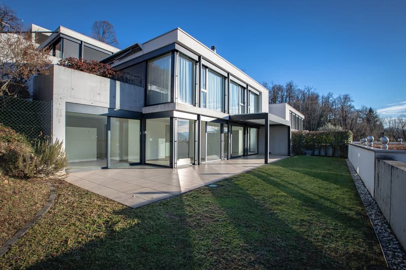 Oasi di prestigio a 10 minuti dal centro di Lugano: Moderno 3.5 locali con ampio giardino (5)