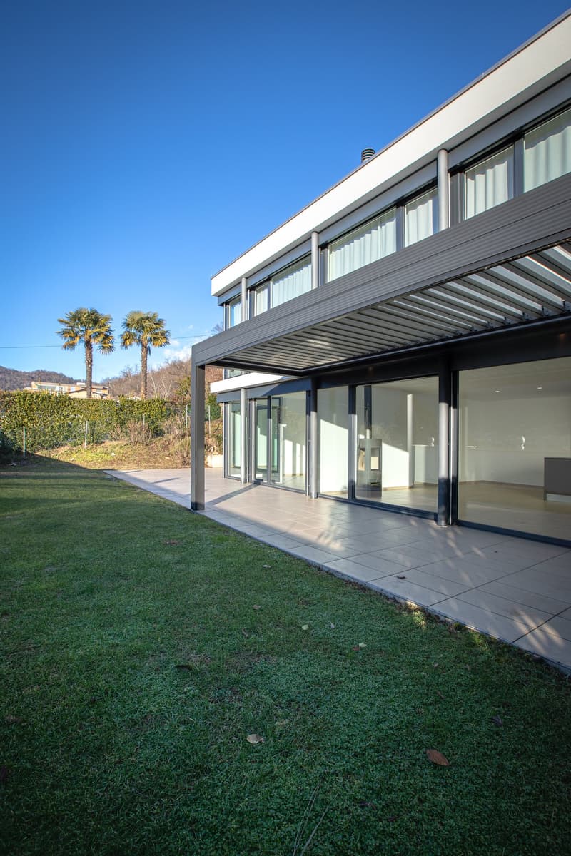 Oasi di prestigio a 10 minuti dal centro di Lugano: Moderno 3.5 locali con ampio giardino (6)