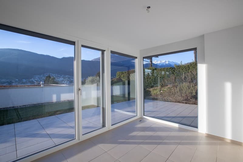 Oasi di prestigio a 10 minuti dal centro di Lugano: Moderno 3.5 locali con ampio giardino (21)