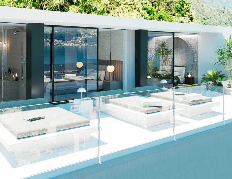 Attico da sogno con vista lago, wellness e piscina (5)