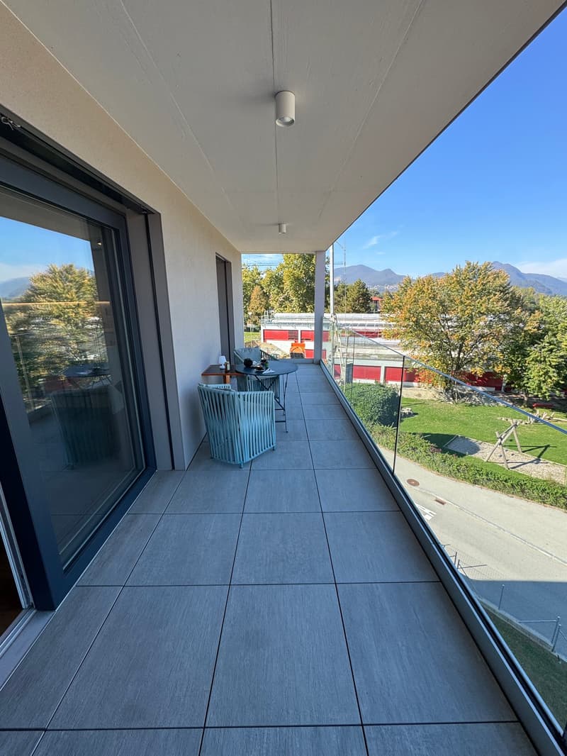 Novazzano – Modern penthouse with panoramic terraces and high-end finishes (2)