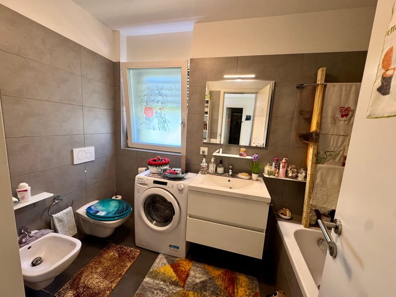 Appartement moderne 4.5 pièces avec grand jardin privé à Rancate (10)