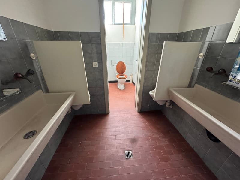 Bathroom with sink and urinal.