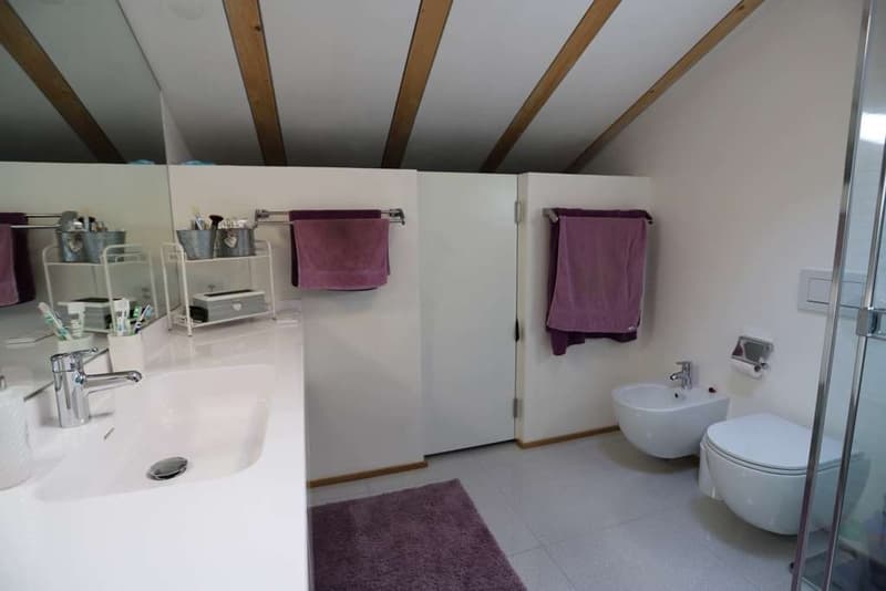 Maison de noyau rénovée à Bissone (6)