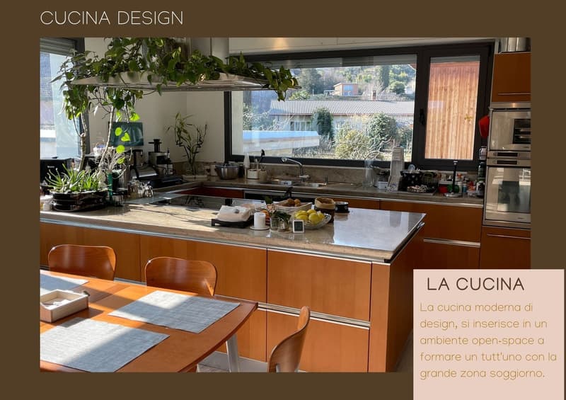 Spacious modern kitchen with large windows overlooking a scenic outdoor view, wooden cabinets, granite countertops, and various kitchen appliances and accessories