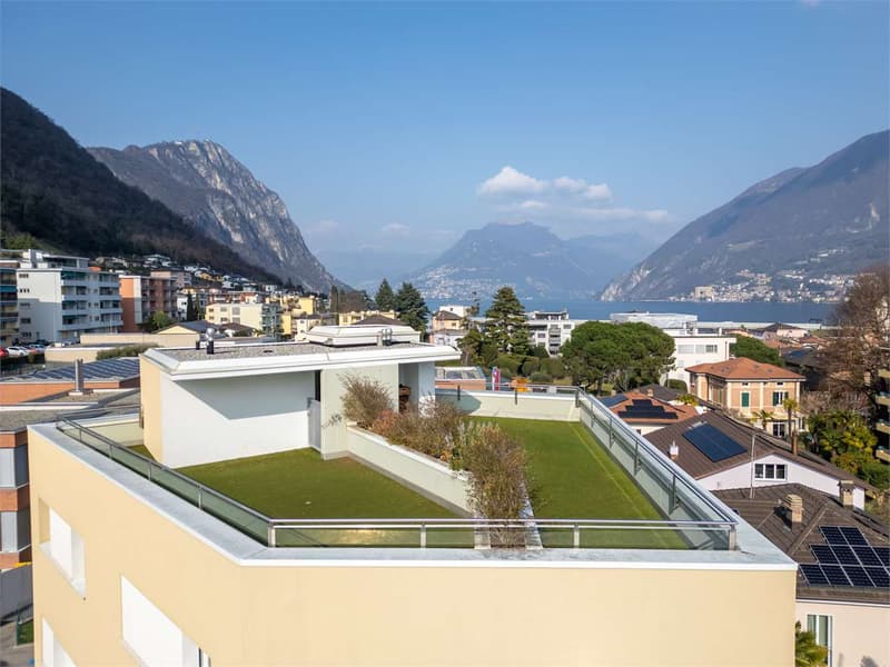 Melide -  moderno 4.5 loc. con vista lago e roof-top (11)