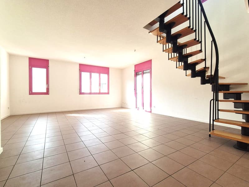 empty room, tiled floor, three windows, staircase on the right