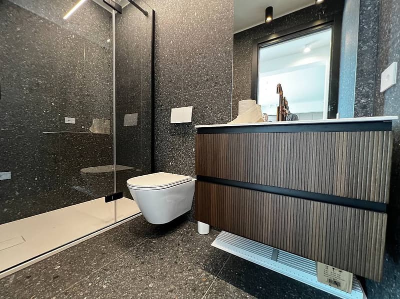Comano, appartement en attique de 3,5 pièces rénové avec grande terrasse (7)