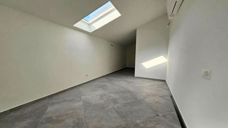 APPARTAMENTO MANSARDATO A CAPOLAGO (8)