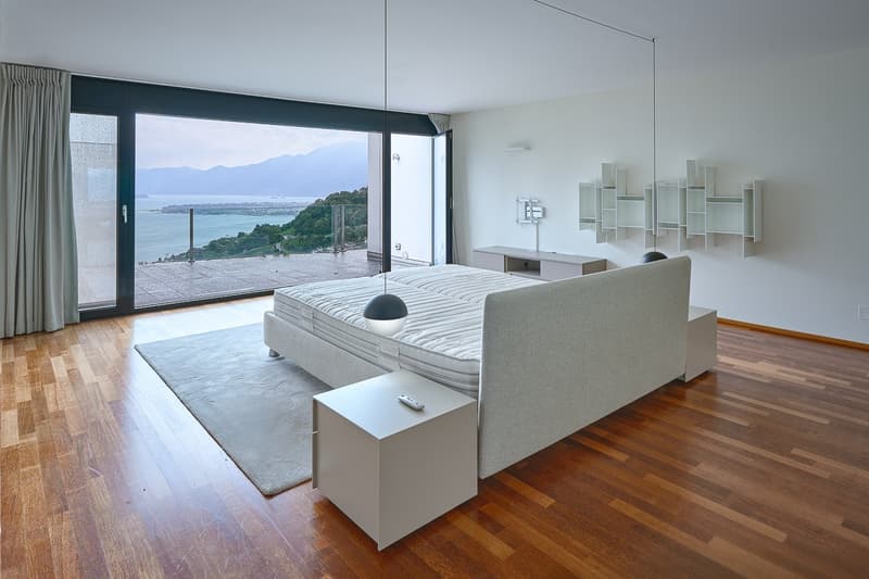 Sliding glass doors, balcony, king size bed, remote control, hanging lamps, hardwood floors, ocean view