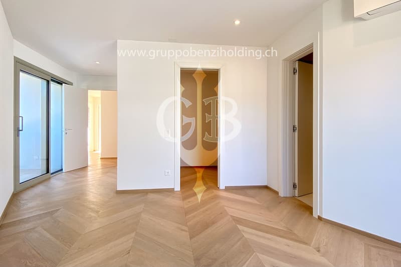 empty, parquet flooring, glass door, white walls, bright