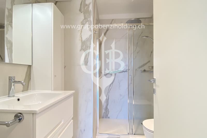 modern white sink, shower, modern white cabinet, glass door