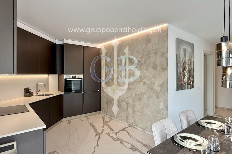 modern kitchen, white marble floors, wooden cabinets, integrated oven and microwave, sink, modern lighting