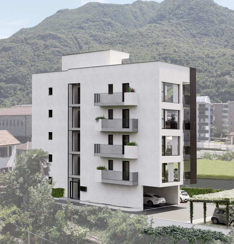 4-story modern apartment building with white exterior, balconies, and parking spaces in the front