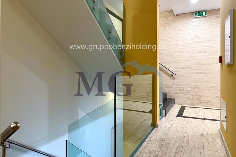 modern design, glass walls, wooden stairs, white tiles