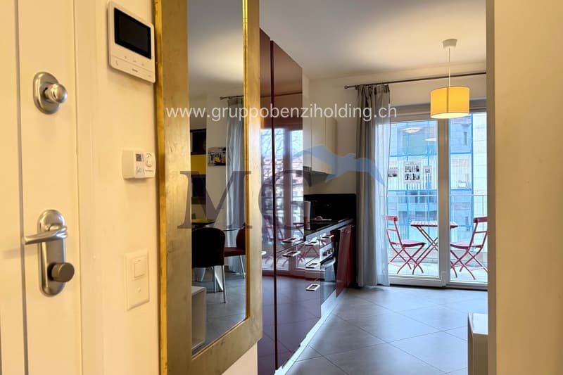 modern living area, windows, balcony, chairs, glass table, door, entrance