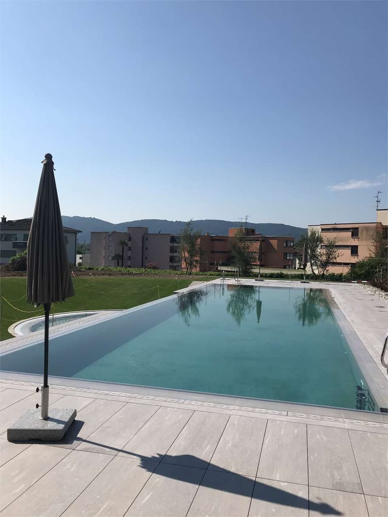 APPARTAMENTO 3.5 LOC. CON PISCINA MORBIO INFERIORE (5)