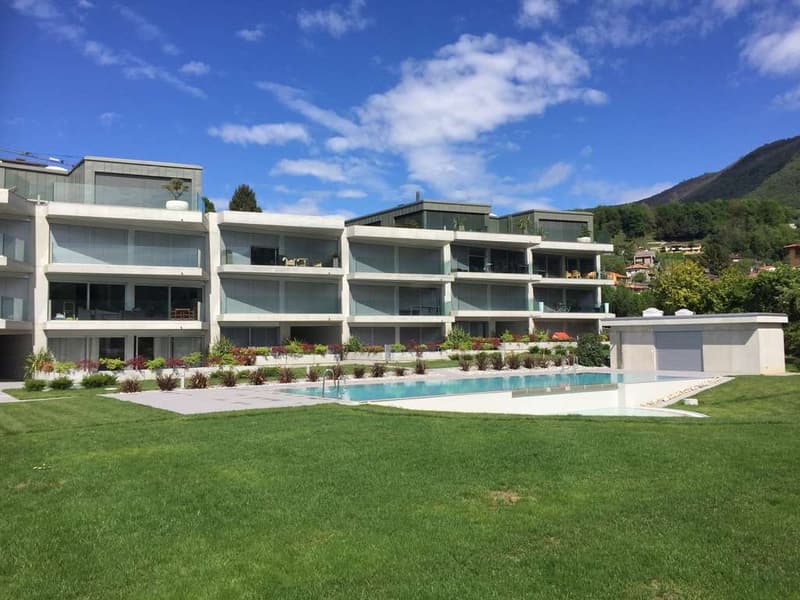 APPARTAMENTO 4.5 LOC. CON PISCINA MORBIO INFERIORE (9)