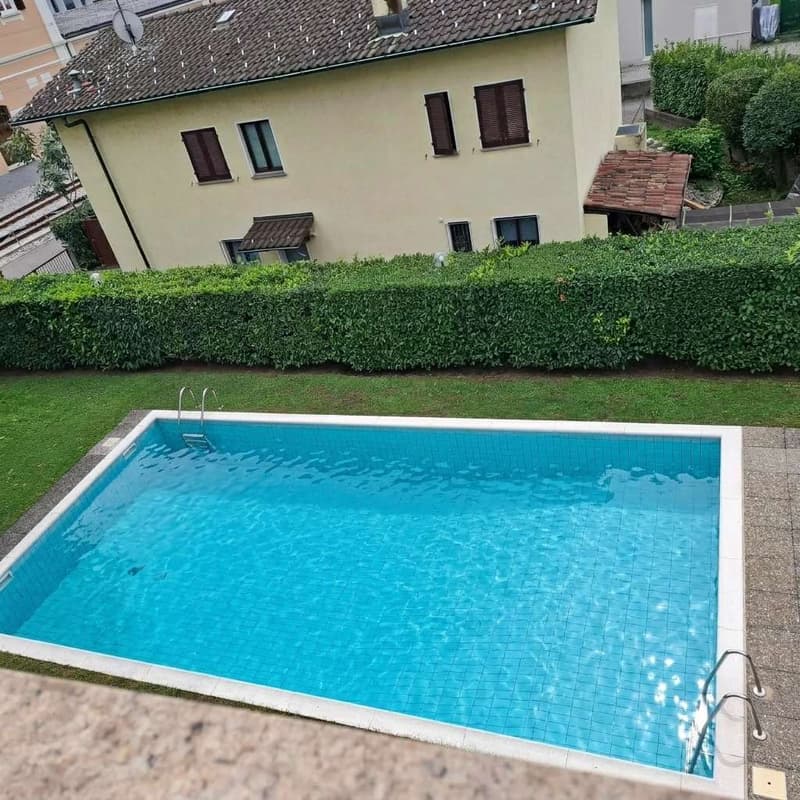 Luminoso 3.5 locali ad Agno con piscina condominiale e giardino (13)