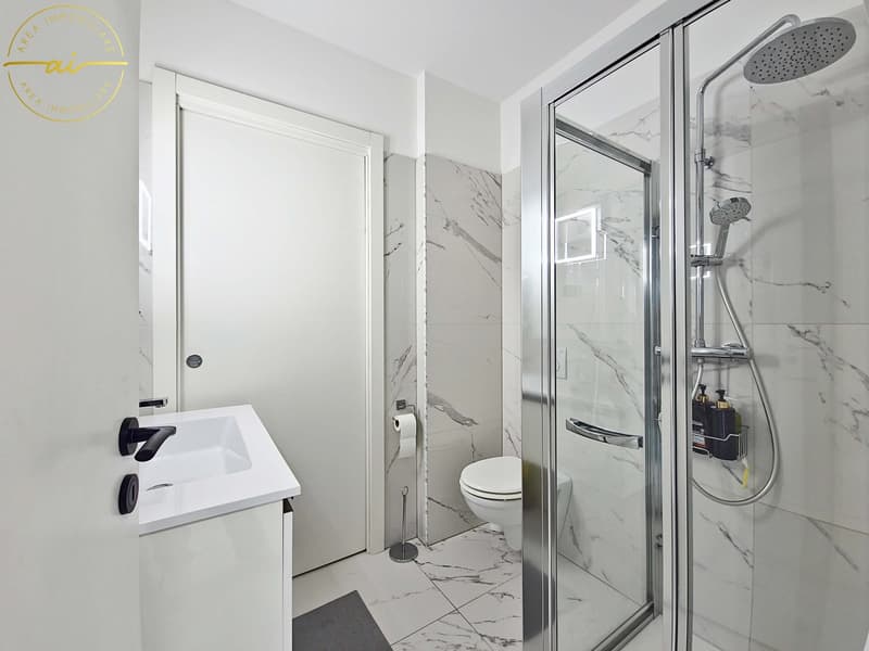 Elegantes und helles 4.5-Zimmer-Wohnung mit privatem Garten in Viganello (9)