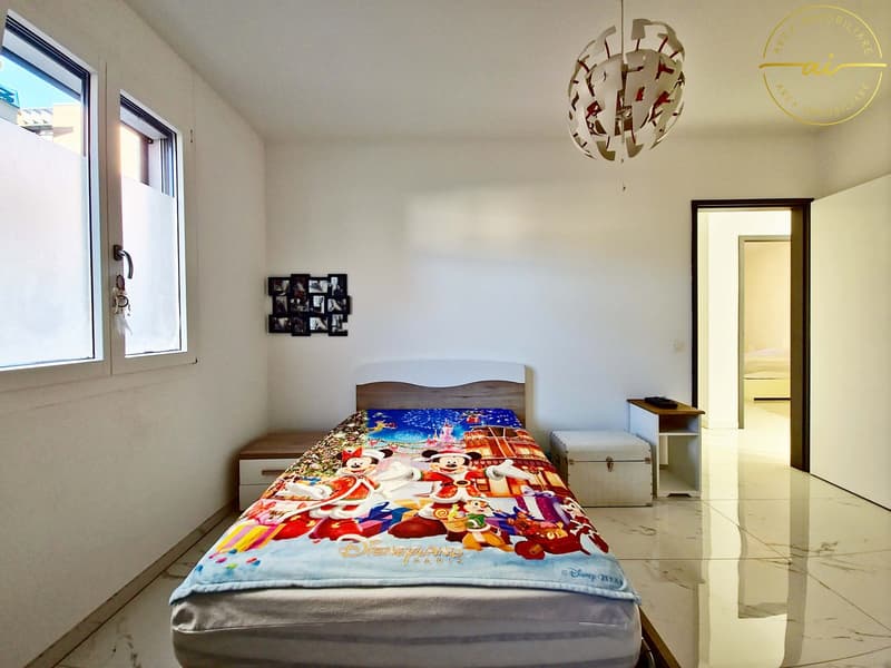 Elegantes und helles 4.5-Zimmer-Wohnung mit privatem Garten in Viganello (14)