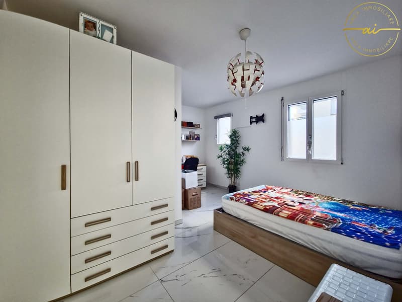 Elegantes und helles 4.5-Zimmer-Wohnung mit privatem Garten in Viganello (13)