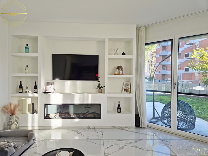 Elegantes und helles 4.5-Zimmer-Wohnung mit privatem Garten in Viganello (5)