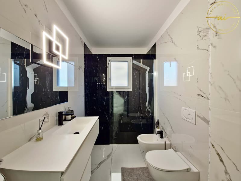 ELEGANTE E LUMINOSO 4.5 LOCALI CON GIARDINO PRIVATO A VIGANELLO (17)