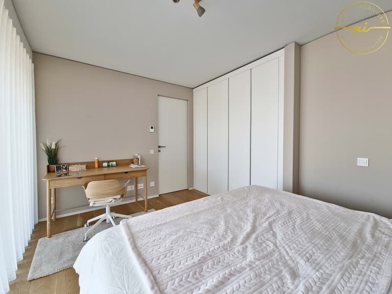 ELEGANTE APPARTAMENTO 3.5 LOCALI CON TERRAZZA E VISTA LAGO PARZIALE A PARADISO (10)