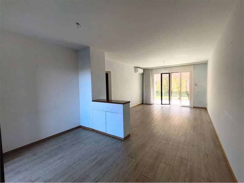 Caslano - Geräumige 3.5 Zimmer Wohnung im Erdgeschoss mit Garten - Zwei Schritte entfernt (1)