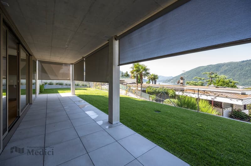 Balcony with outdoor shades and panoramic views