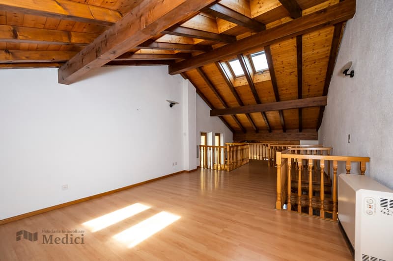 wooden ceiling, hardwood floor, metal handrail, window