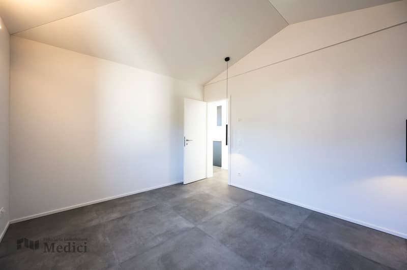 empty room, white walls, gray floor, open door, hallway