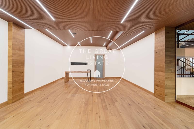 Hardwood floors, wooden walls, minimalistic design, bright lighting
