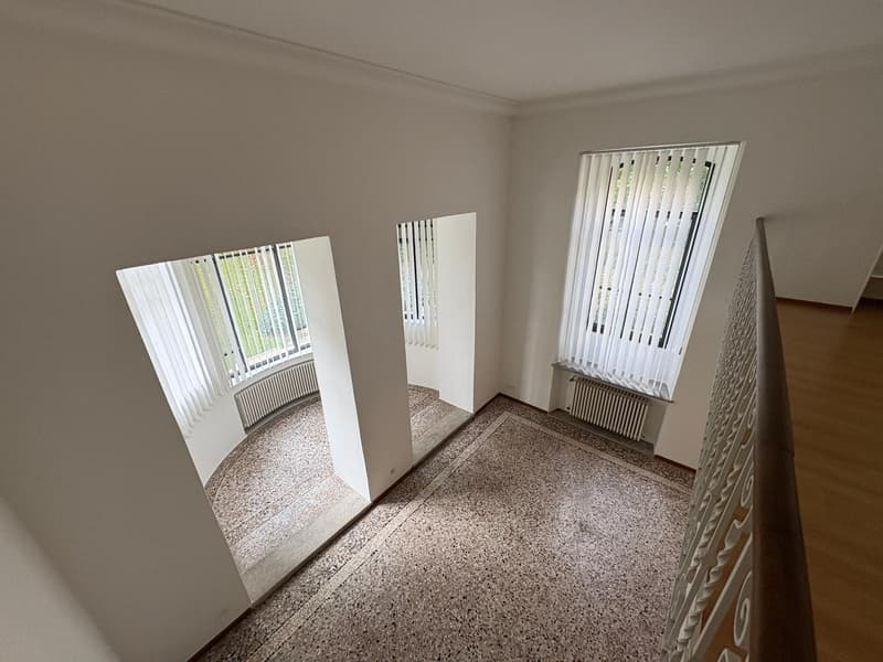 empty hallway, staircase, large windows, heating, marble floor