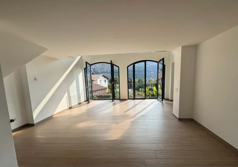 Elegante Duplex di 4.5 Locali con Vista Panoramica a Barbengo (1)