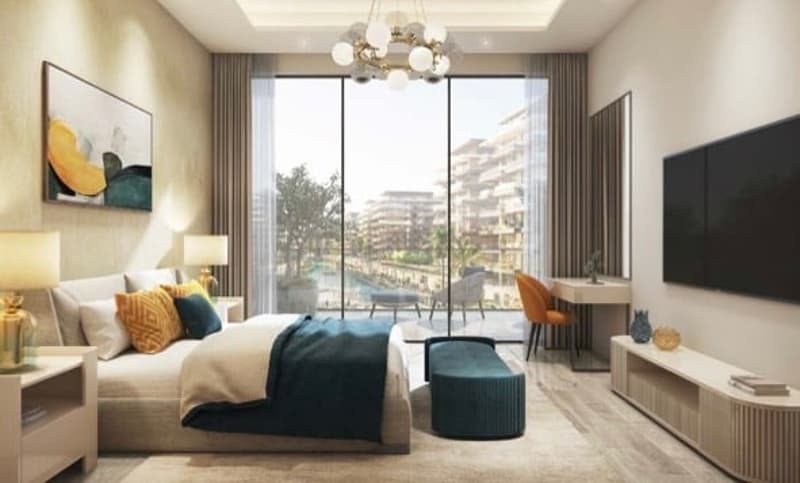 modern bedroom with large bed, white windows, floor lamp, desk, table, chairs, flat screen TV, chandelier