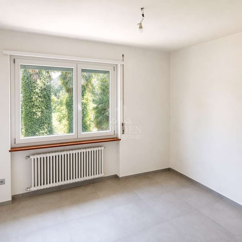 Spacious 4.5-room apartment with private garden in Tremona renovated (5)