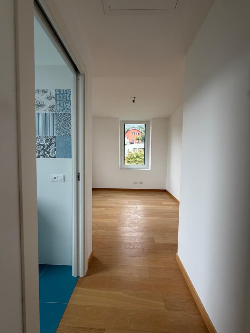 Magliaso – Elegante 3,5 locali immerso nel verde con balcone e posteggio (14)
