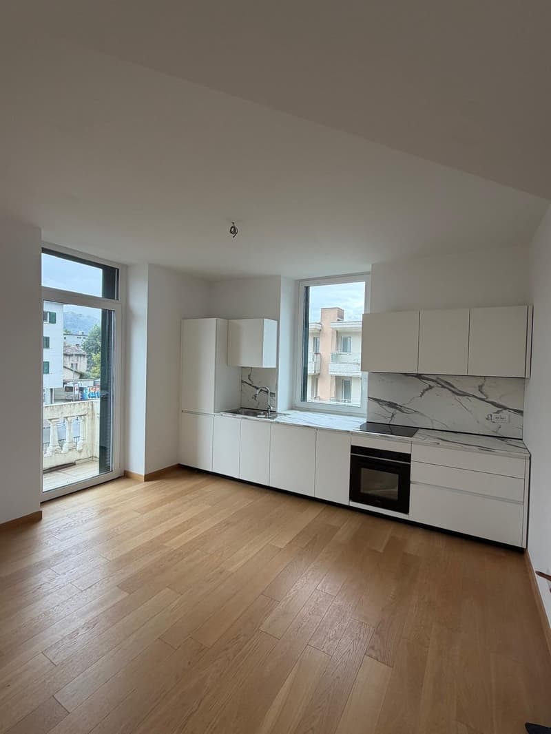 Magliaso – Elegante 3,5 locali immerso nel verde con balcone e posteggio (13)