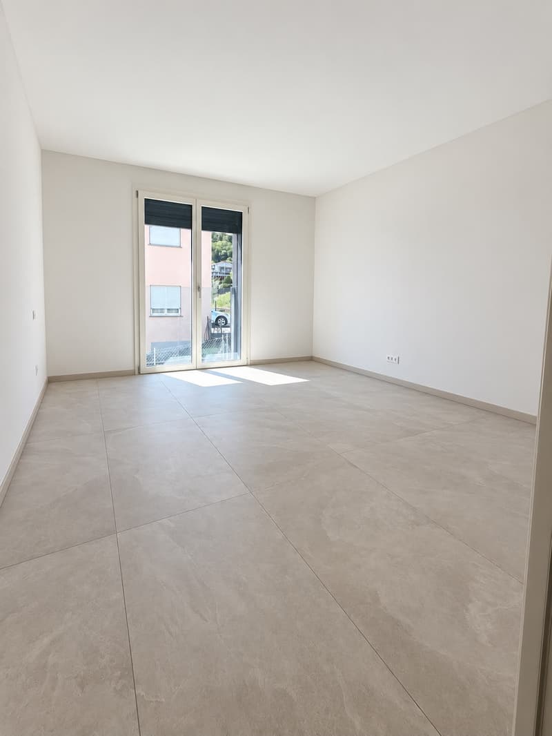 APPARTAMENTO 4.5 LOCALI CON AMPIO PORTICO IN AFFITTO A BIOGGIO (4)