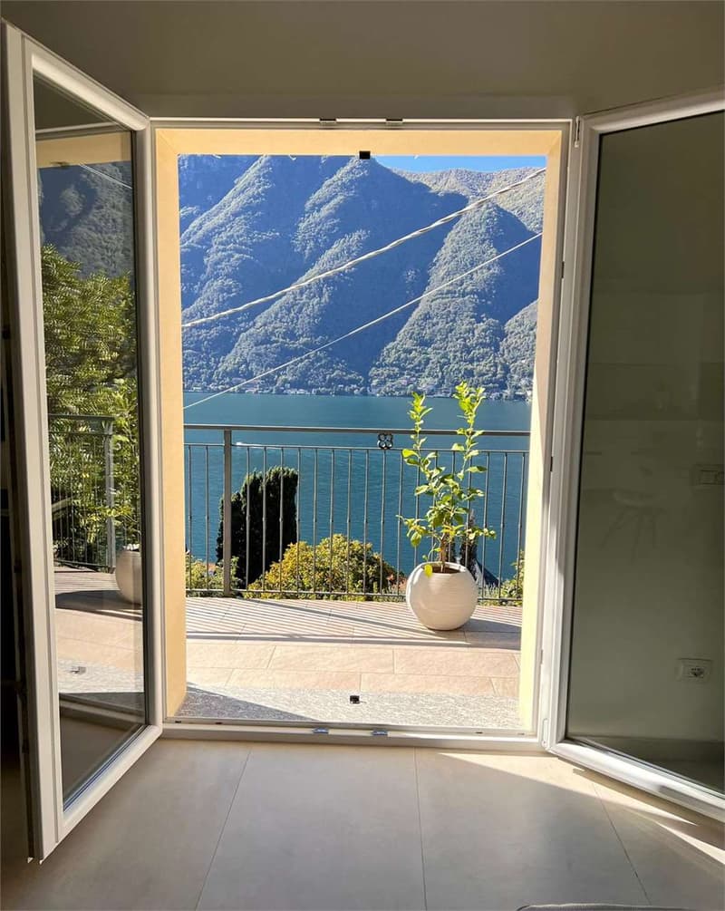 Elegante trilocale completamente arredato con terrazzo fronte lago (12)