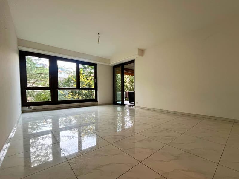 LUGANO LORETO – LUMINOSO 3.5 LOCALI CON AMPIA TERRAZZA, IMMERSO NEL VERDE (3)