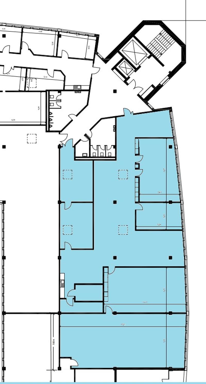 The floor plan shows a large open space with multiple rooms, including a living room, kitchen, and several bedrooms. There is a balcony or terrace visible on the plan.