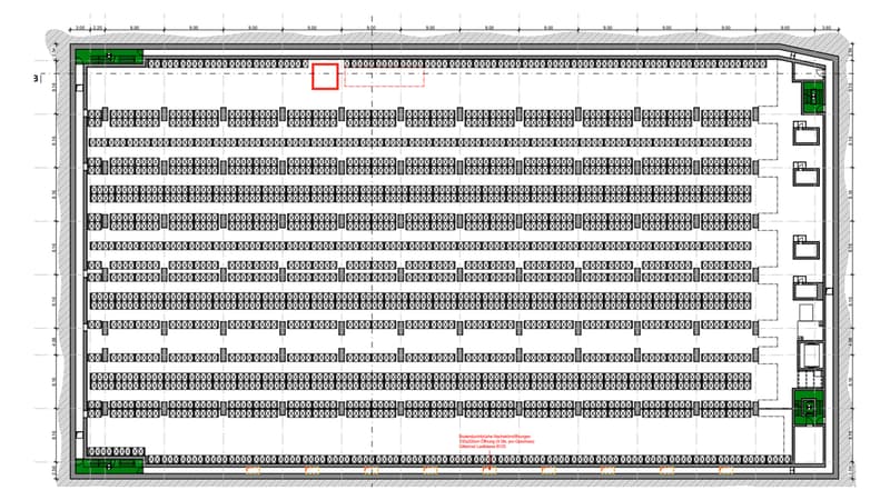 An image of a large room or hall with rows of seats