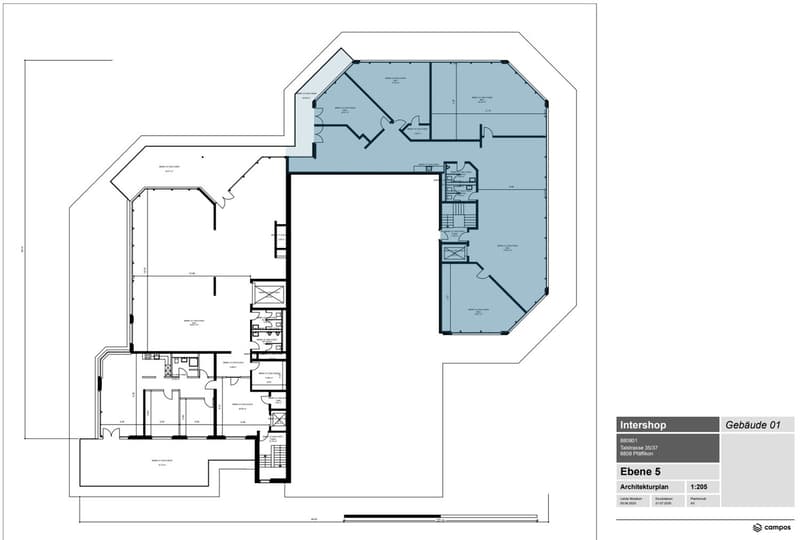 Intershop floor plan with multiple rooms including office spaces, meeting rooms, storage rooms, kitchen, and hallways.