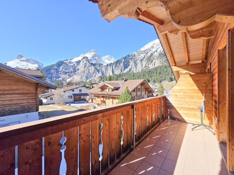 wooden balcony, tiled floor, wooden railing, mountain view