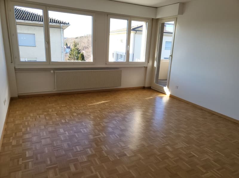 Wohnzimmer mit Balkon
