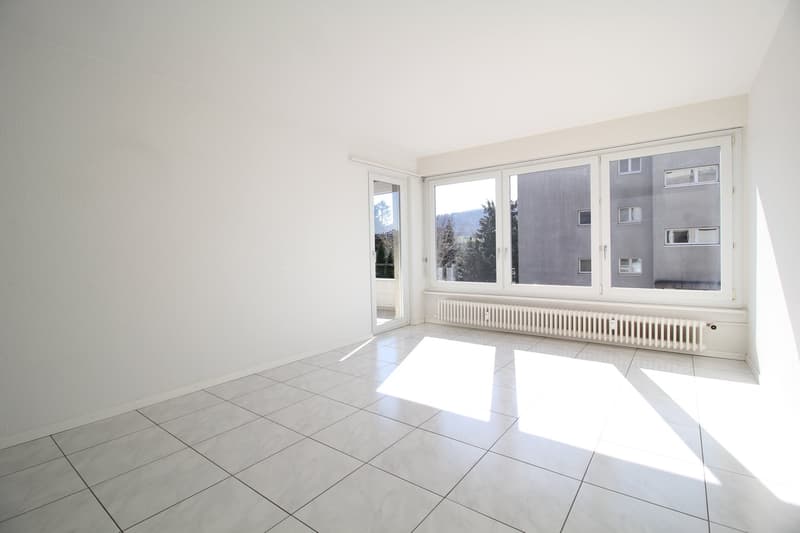 empty room, white tiles, white walls, large windows, balcony